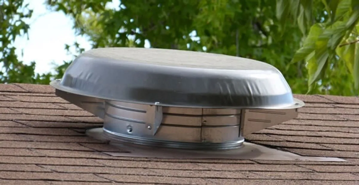 attic fan installation services with low-profile roof ventilation unit in Buffalo, NY