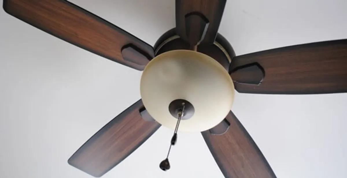 Fully installed ceiling fan with balanced blades and light fixture in Buffalo, NY