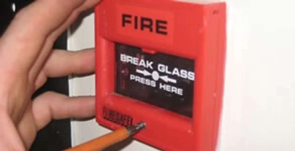 fire alarm installation service showing manual fire alarm pull station installed by licensed electricians in Buffalo, NY