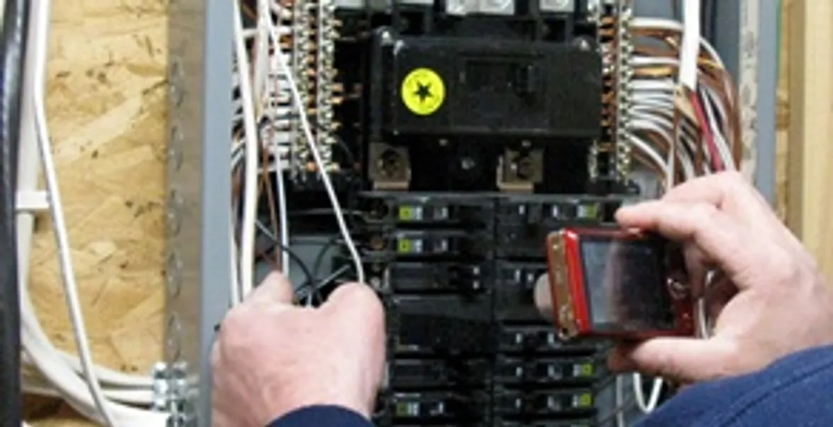 Home electrical inspection of circuit breaker panel by licensed electrician in Buffalo, NY