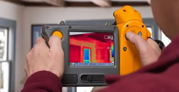 home energy audit service capturing thermal readings to analyze insulation and electrical efficiency in Buffalo, NY