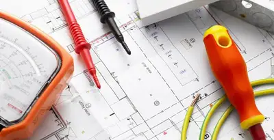 licensed electrician planning and testing electrical systems using professional tools in Buffalo, NY