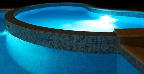 pool light installation and repair services highlighting illuminated pool interior lighting in Buffalo, NY