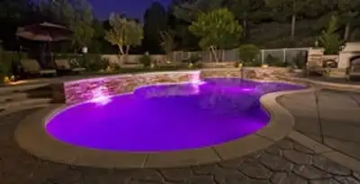 pool light installation and repair services illuminating a residential swimming pool in Buffalo, NY