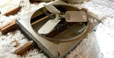 whole house fan installation services with attic-mounted ventilation unit in Buffalo, NY